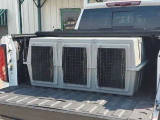 Easy Loader Triple Dog Box with three compartments accommodates smaller and midsize dogs. Each compartment is approximately 14.75” wide.